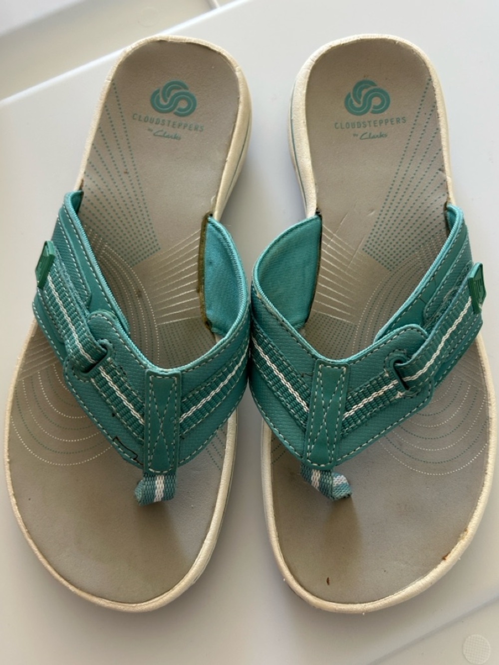 Clark’s 
Women’s Beige Leather Slip-On Mules